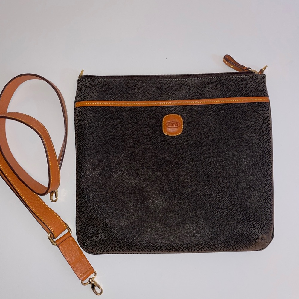 Birc’s leather cross body bag. W/ warranty card